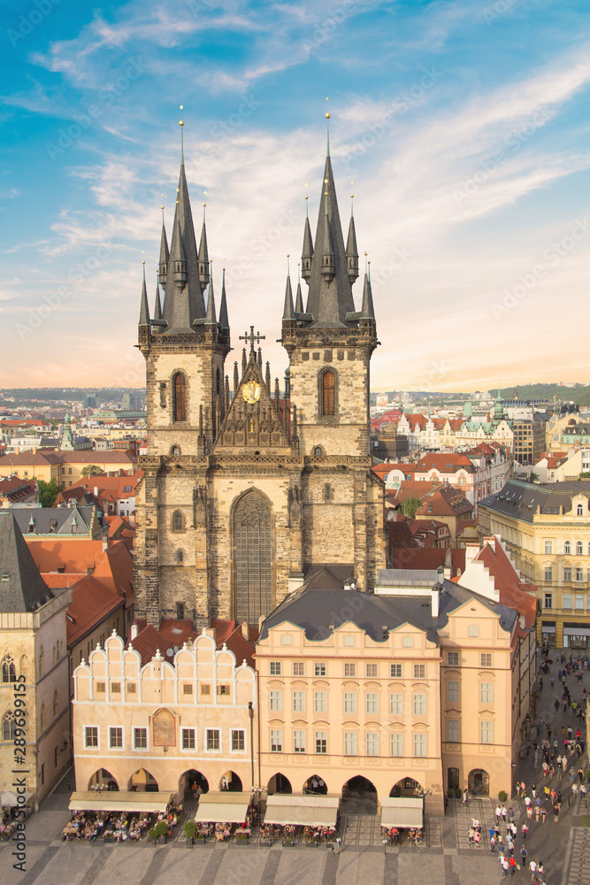ful view of the Old Town Square, and Tyn Church in Prague, Czech Republic