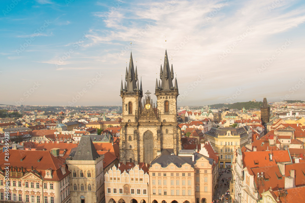 ful view of the Old Town Square, and Tyn Church in Prague, Czech Republic