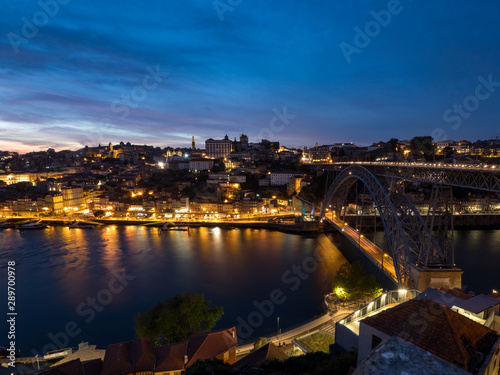Ribeira district - historic center of Porto with Douro river and Porto cathedral in night (Porto, Portugal, Popular travel destination in Europe)