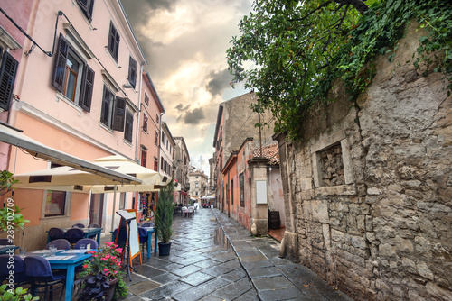 Narrow street in historic center in Pula. Istria, Croatia