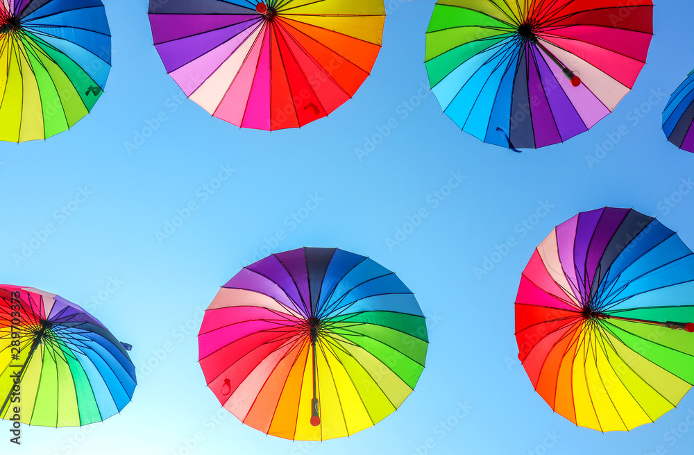 colorful umbrellas against the blue sky