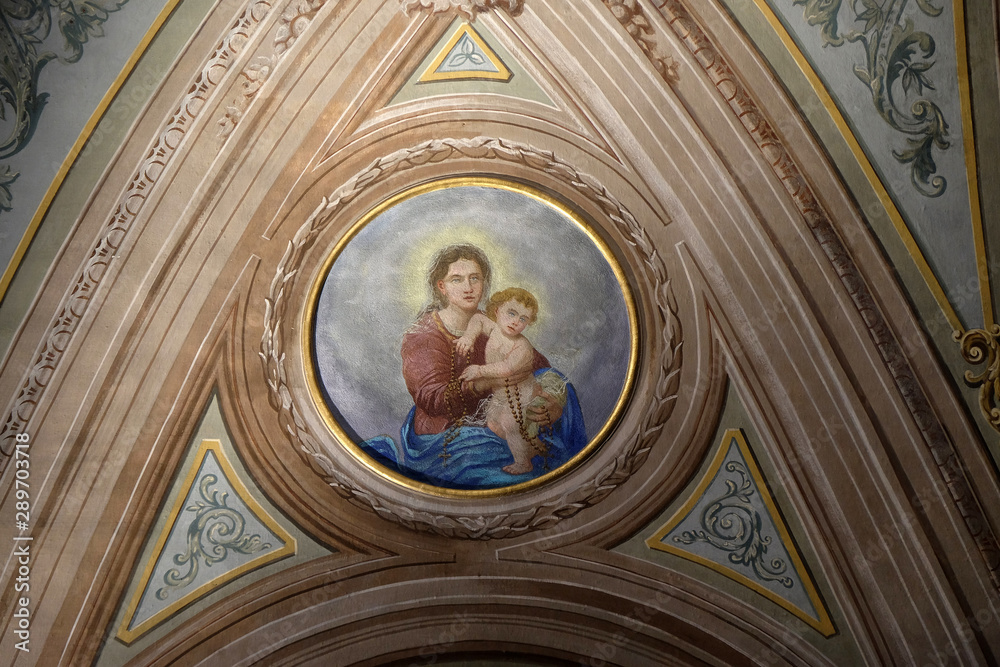Virgin Mary with baby Jesus, ceiling fresco in the church of St. Victor on the Fishermen Island, one of the famous Borromeo Islands of Lake Maggiore, Italy