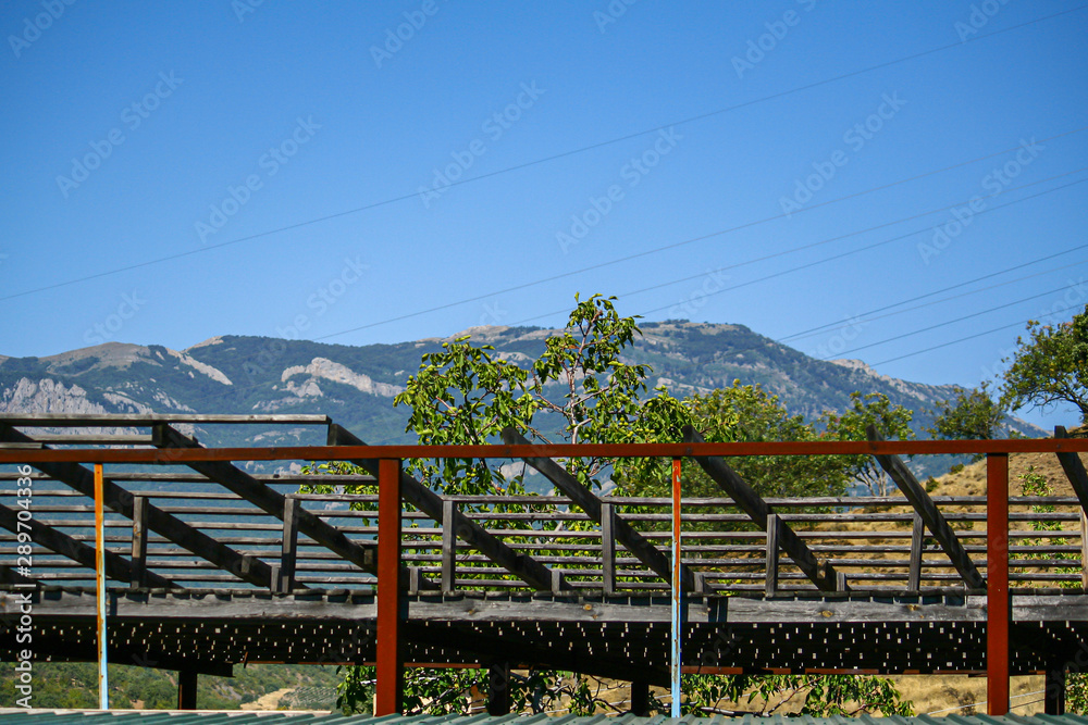 Wooden balcony on the highland of the valley, mountain