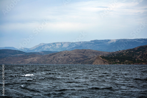 Panoramic view towards Green bay of Novy Svet (New World) shoot from sea, Sudak area, Crimea