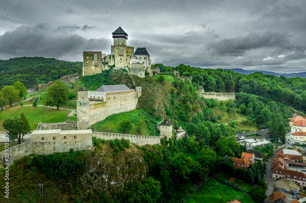 Aerial panorama view of Trencin castle with medieval donjon  in Slovakia above the Vah river