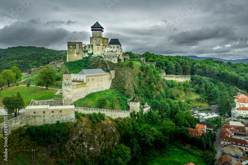 Aerial panorama view of Trencin castle with medieval donjon in Slovakia above the Vah river