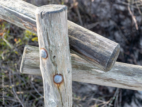 wooden fence corner fastening with iron screws