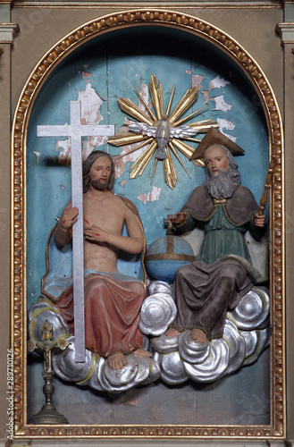 Holy Trinity, statue on the altar in Saint Catherine of Alexandria church in Ribnicki Kunic, Croatia 