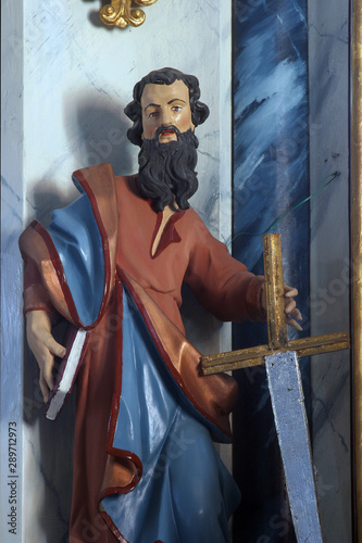 Saint Paul, statue on the main altar in Saints Cosmas and Damian church in Vrhovac, Croatia photo