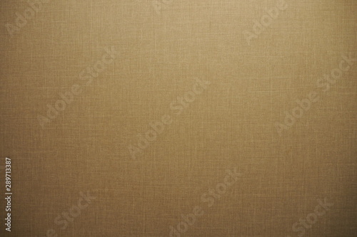 Closeup of beautiful fabric texture in dark warm brown and golden tone for luxury background and wallpaper Cool banner on page cover presentation and cover