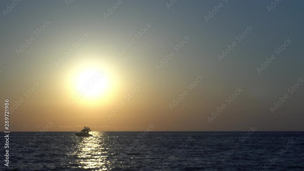 Colorful sunset above the sea surface with sailing yachts, Colorful sunset above the sea surface with sailing yachts,