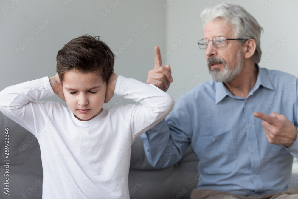 Angry old grandpa shouting at grandson close ears ignore grandfather Stock  Photo | Adobe Stock