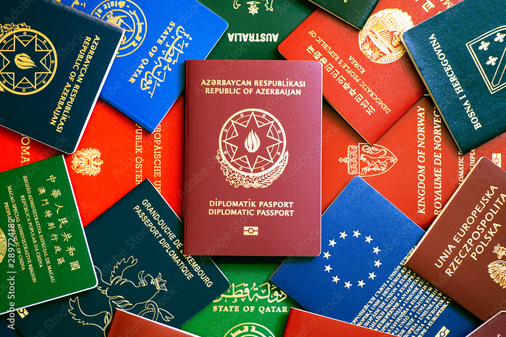The burgundy diplomatic passport of Azerbaijan against the colorful