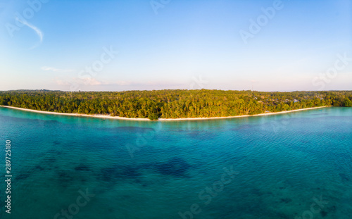 Aerial view tropical beach island reef caribbean sea at sunset. Kei Island, Indonesia Moluccas archipelago. Top travel destination, best diving snorkeling, stunning panorama.