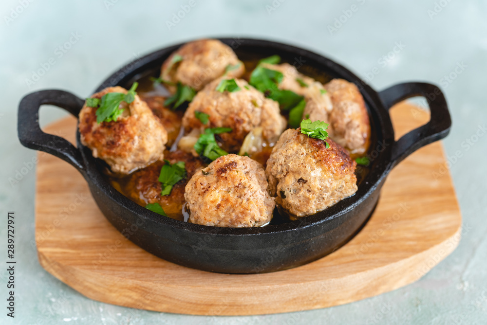 Homemade pork and beef meatballs in gravy Homemade pork and beef meatballs in gravy