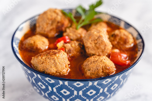 Pork and beef meatballs in tomato and paprika sauce
