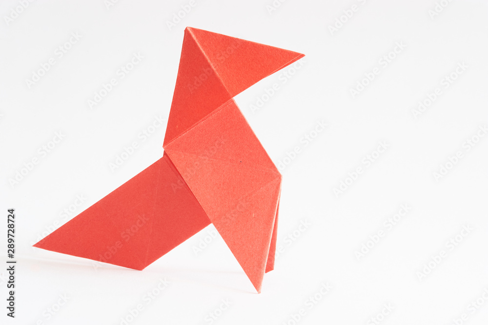 Photograph of a colored paper bow tie in front of a white background. Space for text. Background. For presentations Photograph of a colored paper bow tie in front of a white background. Space for text. Background. For presentations