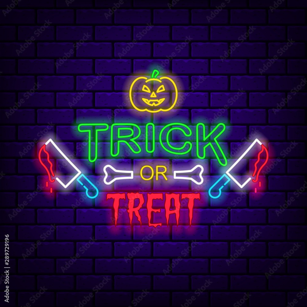 Trick or treat. Neon sign on dark brick background.
