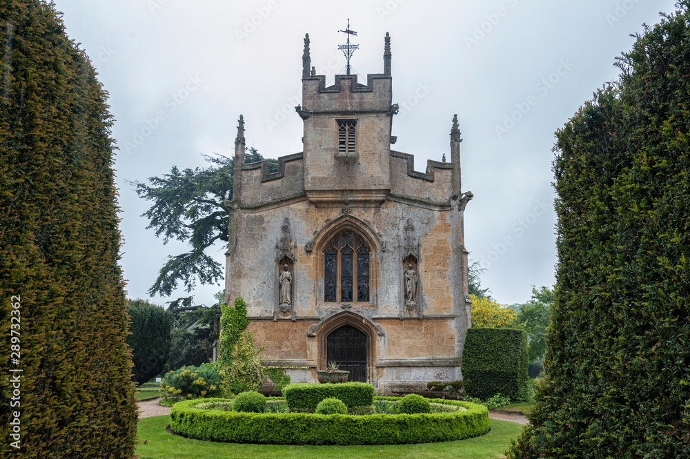 ST. MARY'S CHAPEL, SUDELEY CASTLE, WINCHCOMBE, GLOUCESTERSHIRE, ENGLAND - MAY, 26 2018: The Chapel is the buriel place of Catherne Parr the 6th wife of King Henry VIII ST. MARY'S CHAPEL, SUDELEY CASTLE, WINCHCOMBE, GLOUCESTERSHIRE, ENGLAND - MAY, 26 2018: The Chapel is the buriel place of Catherne Parr the 6th wife of King Henry VIII