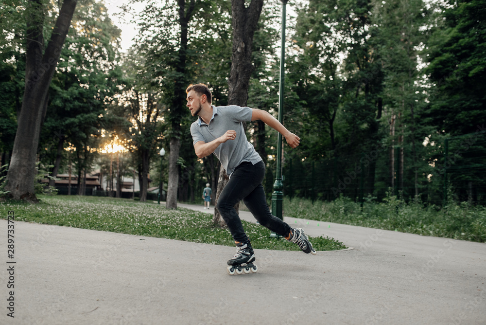 Roller skating, male skater rolling in action Stock Photo Adobe Stock