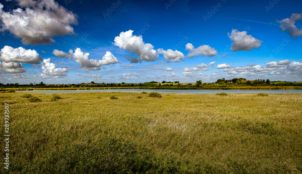 Fototapeta premium Clouds and landscape in Denmark, September 2019.