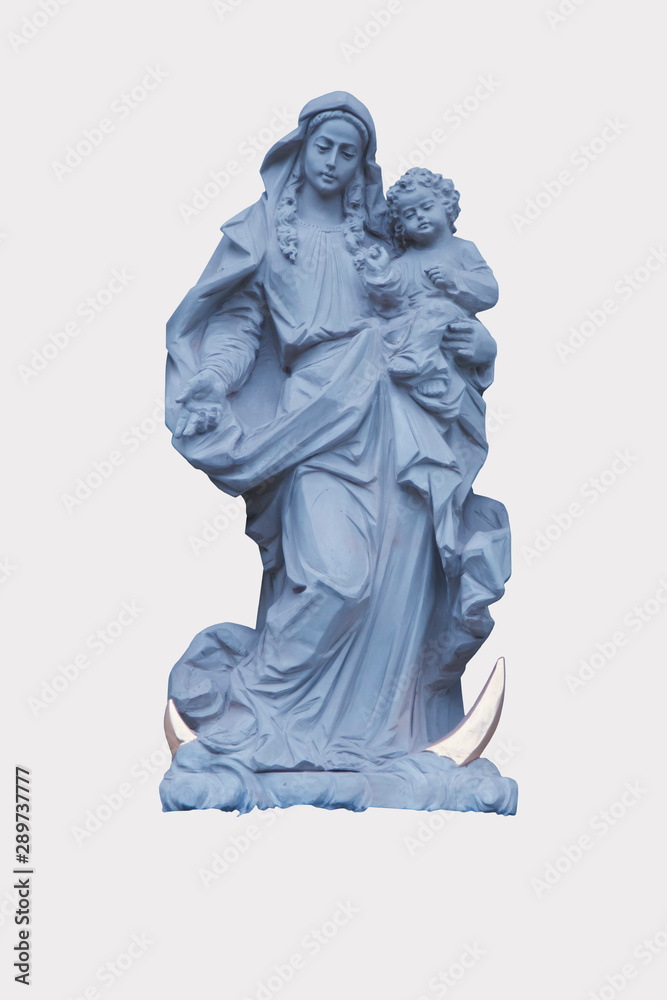 Ancient statue of Virgin Mary with baby Jesus Christ. Religion, faith, love, Christianity concept.