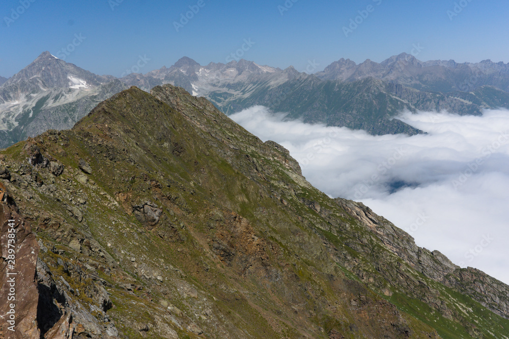 View from mountain lookouts near dombay in the greater caucasus, norther caucasus, can be reached by hiking or with a cable car, raw original View from mountain lookouts near dombay in the greater caucasus, norther caucasus, can be reached by hiking or with a cable car, raw original