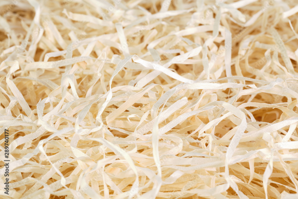 Wood background. Close-up of wooden shavings for packing.