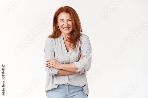 Bright happy successful redhead middle-aged woman loved caring mother laughing funny grandchild cross arms chest confidence delight giggle gaze camera accomplished joyful, white background