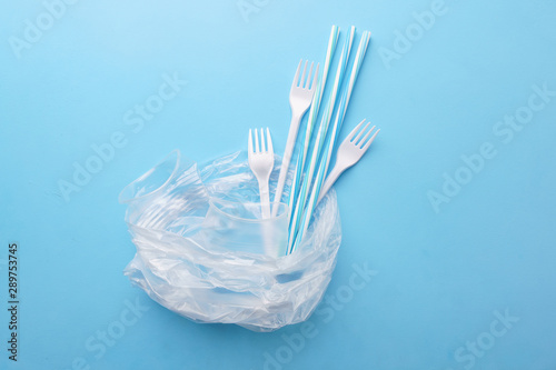 Plastic garbage on blue background. Ecological  environmental pollution  recycling and zero waste concept