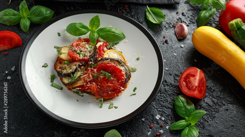 Ratatouille Vegetable Stew with zucchini, eggplants, tomatoes, garlic, onion and basil. Traditional French food. photo