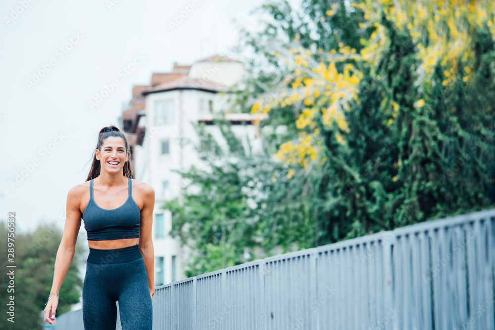 Fitness Woman Jogging Outdoors In The City