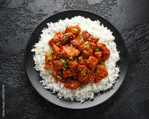 Tso's chicken with rice, green onion and broccoli
