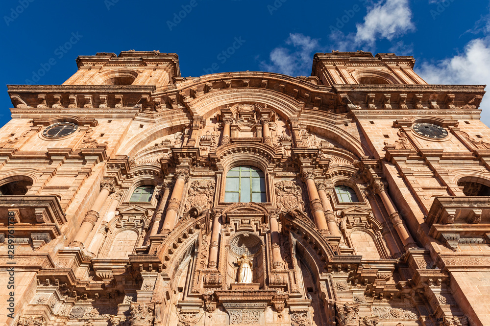 Facade of the baroque style Compania de Jesus church, Plaza de Armas main square, Cusco, Peru.