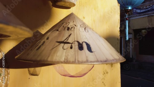 Slow Motion, of decorated Conical hat. Bamboo Asiatic hat rotated. Hoi An, Vientam. photo