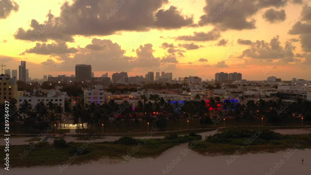 Aerial approach Ocean Drive Miami Beach at sunset 4k Aerial approach Ocean Drive Miami Beach at sunset 4k