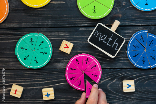 Cuadro en lienzo colorful math fractions on wooden background or table