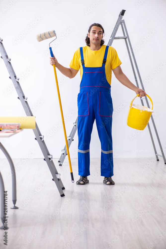 Young man contractor doing renovation at home