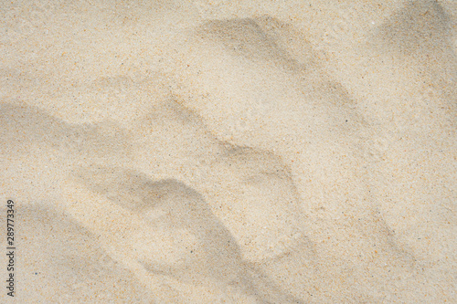 Close up Beach Sand Texture On The Beach In The Summer Sun As Background.