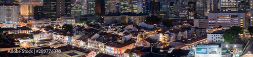 Wide panorama of Central Business District and China town at night in Singapore