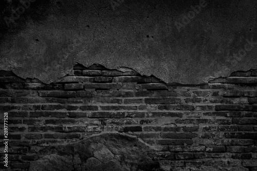 Black brick wall and concrete texture for background. photo
