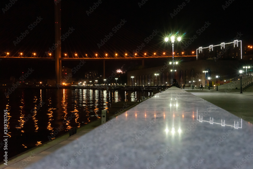 Night cityscape with views of the waterfront Tsarevich.