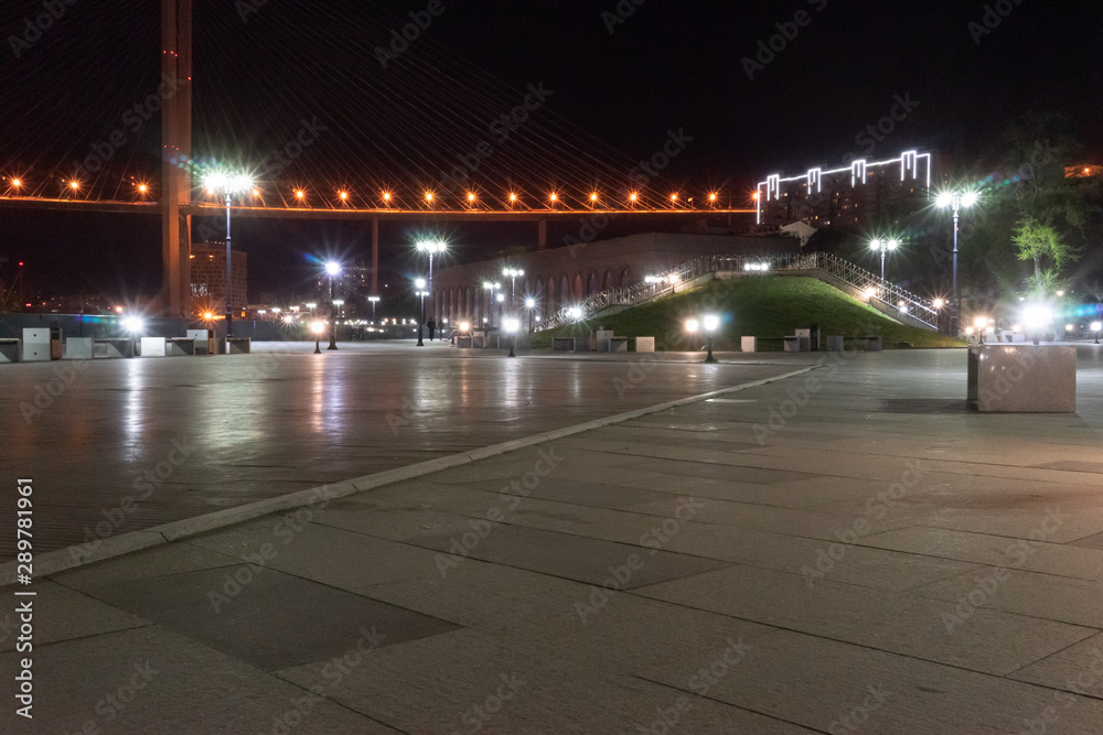 Night cityscape with views of the waterfront Tsarevich.