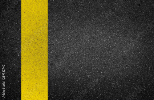 yellow line on the road texture background © tusumaru