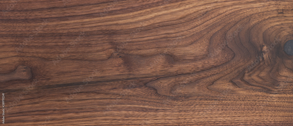 Texture of black walnut board with oil finish Texture of black walnut board with oil finish
