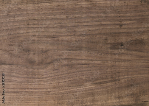 Texture of black walnut board with oil finish