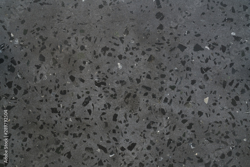 Texture of gray concrete terrazzo with black marble