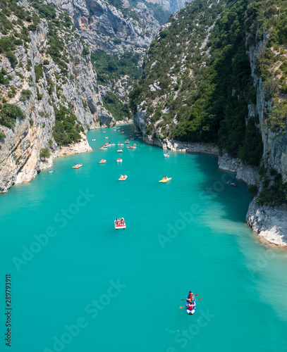 France, july 2019: St Croix Lake, Les Gorges du Verdon with Tourists in kayaks, boats and paddle boats., Provence