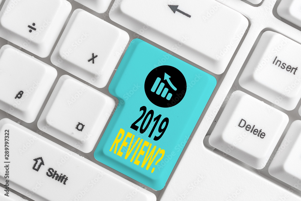 Word writing text 2019 Review Question. Business photo showcasing remembering past year events main actions or good shows White pc keyboard with empty note paper above white background key copy space