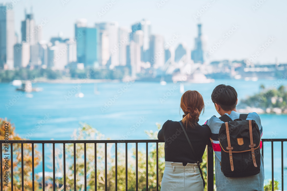Australian couples looking and enjoy beautiful landscape view of Sydney cityscape, Australia. Travel or tourism concept.